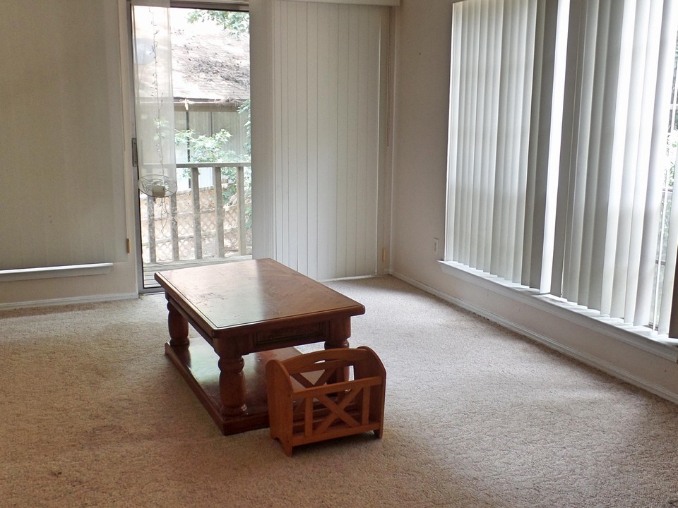 loft has door to upper deck and window looking out toward golf course