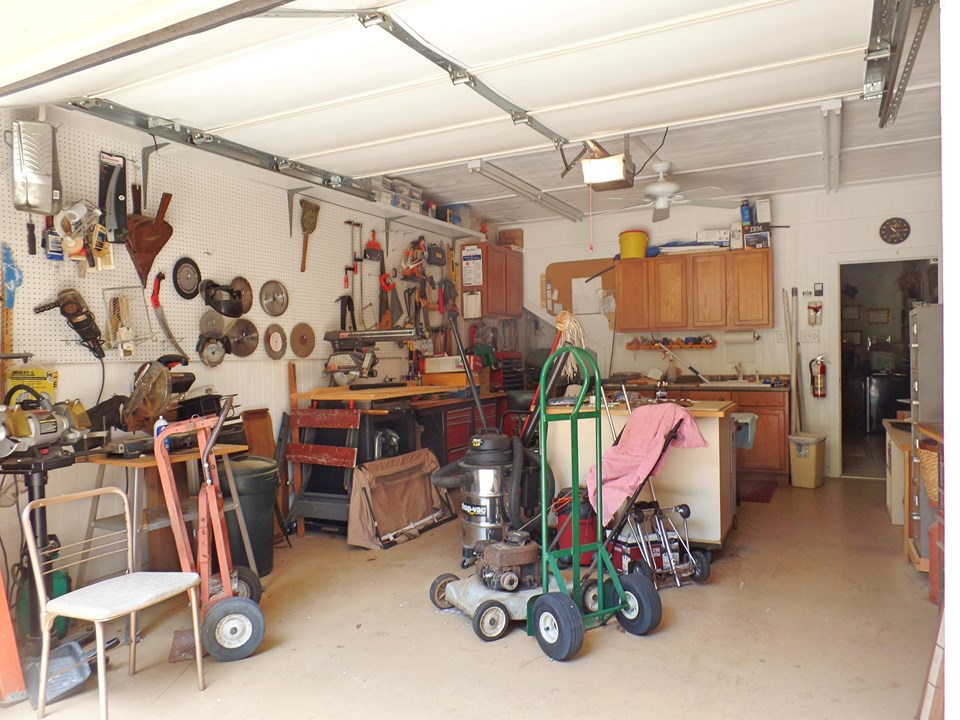 1 car garage or workshop attached to guest house