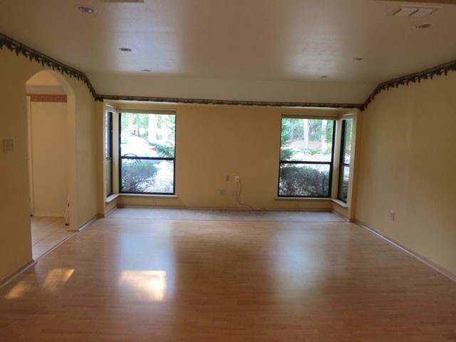 lr view to the front & wooded front yard.