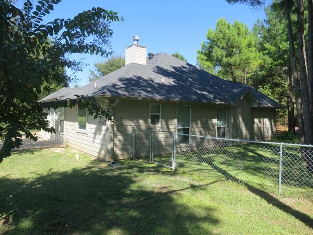 rear view - note the chain link fence.