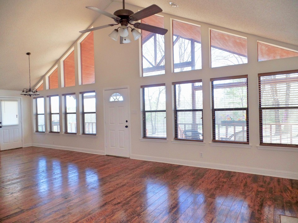 wall of windows with engineered wood floors