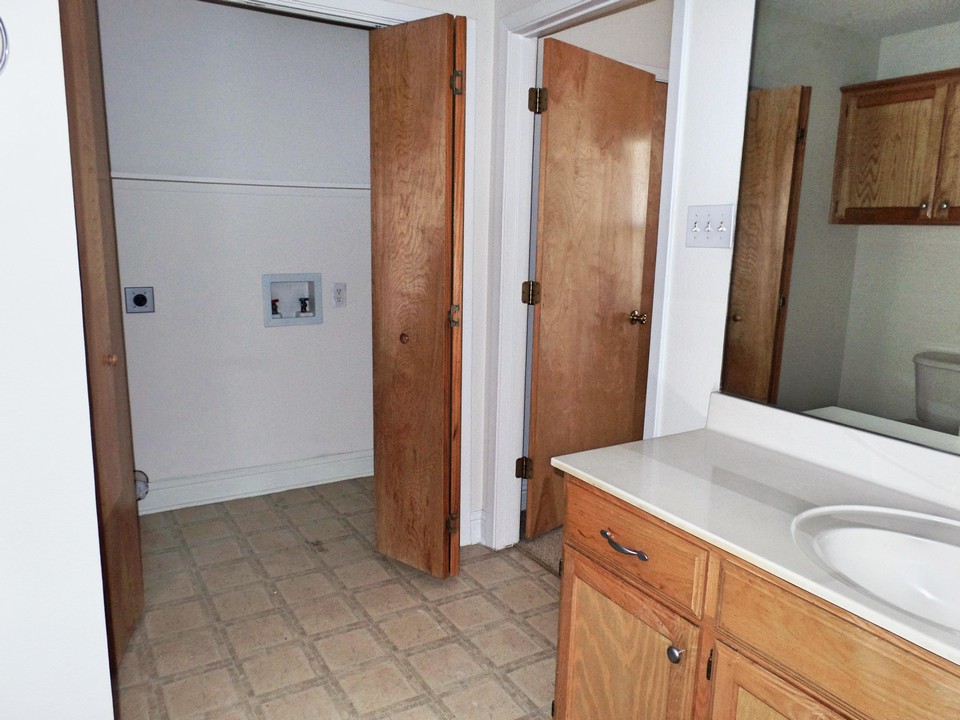 master bath with utility closet