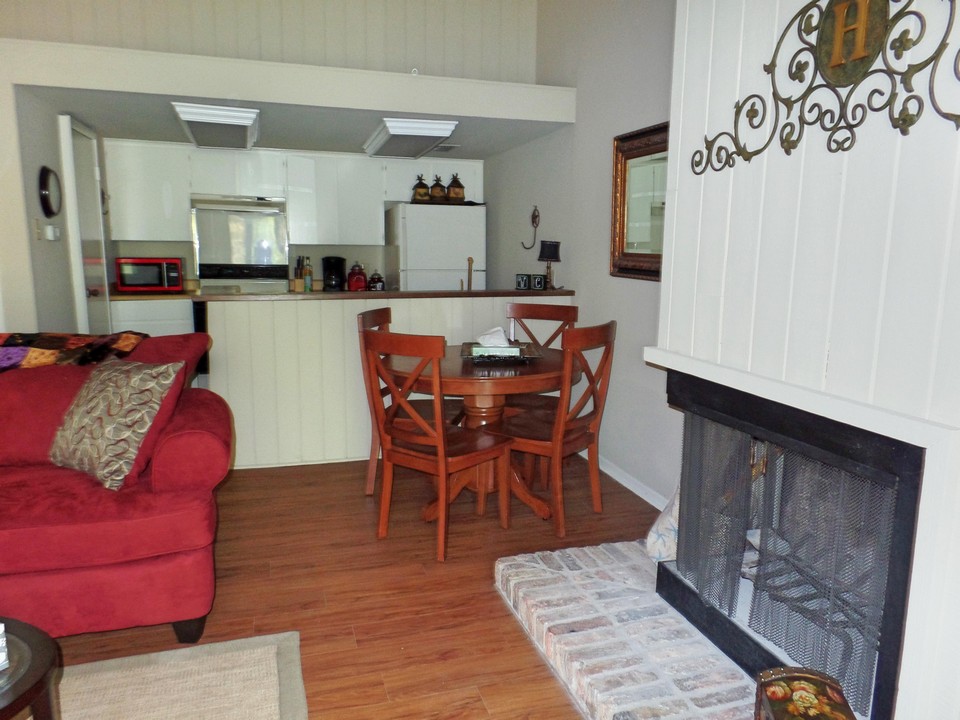 view to dining and kitchen from living