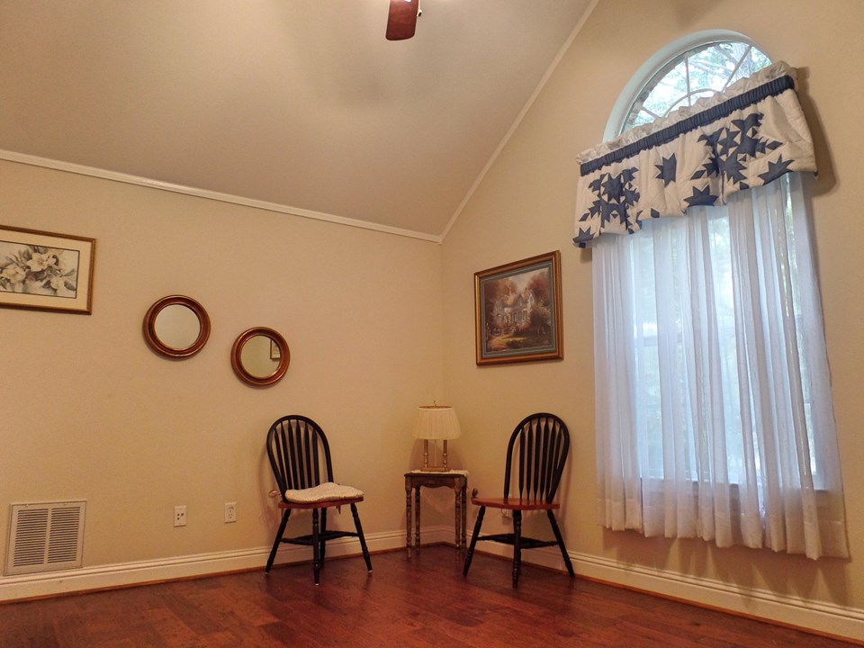 bedroom 3 with wood floor