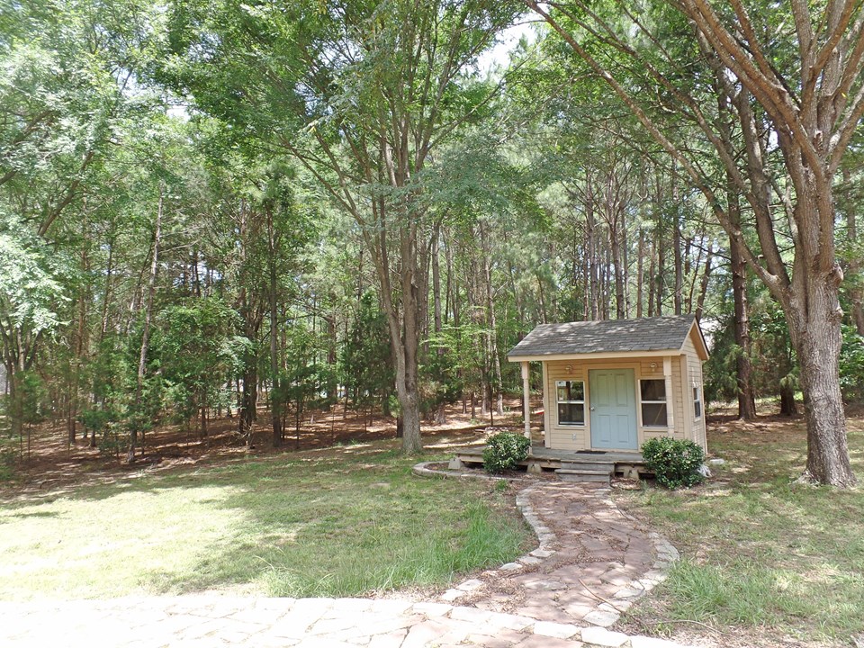 backyard with storage building or playhouse