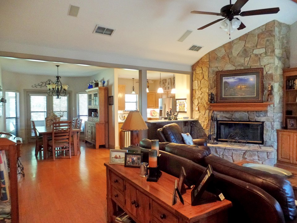 open concept living dining kitchen