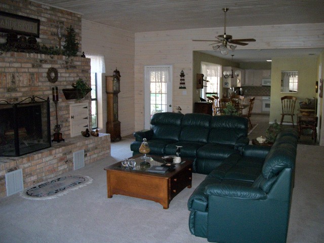 open floor plan with view to the dining room & kitchen.