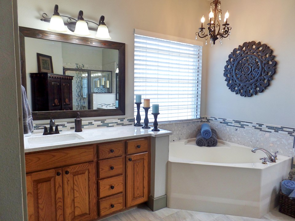 master bath with upgraded fixtures, garden tub