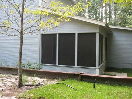screened porch at the rear.